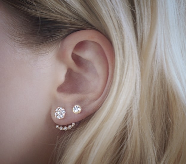 cartier single diamond earrings
