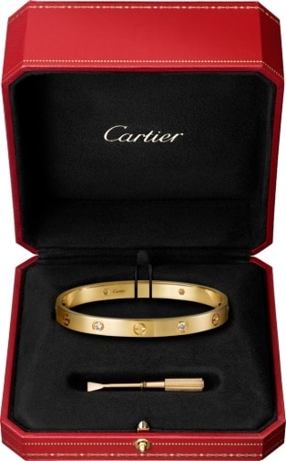 cartier love yellow gold cuff with one diamond