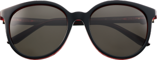 C Décor sunglasses Black composite, red transparent effect, golden finish, grey lenses.