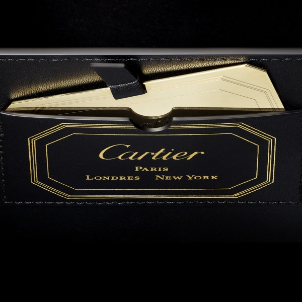 Guirlande de Cartier 手袋，迷你款 黑色小牛皮，金色飾面