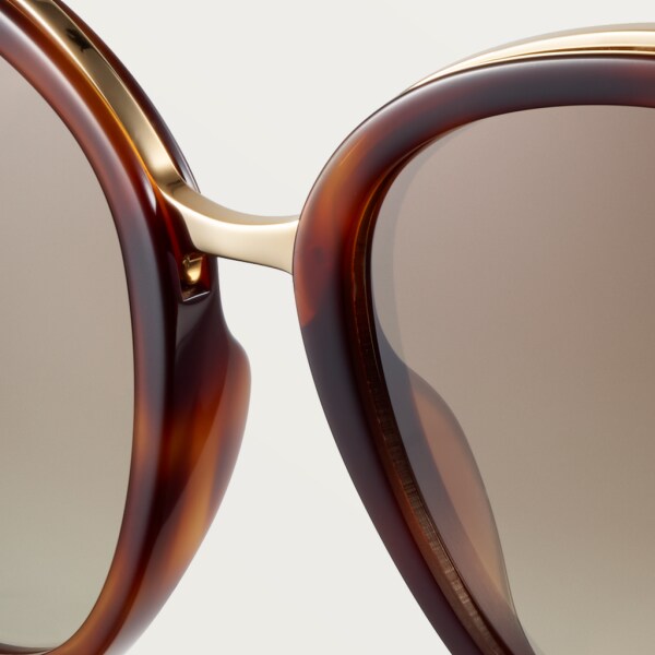 Panthère de Cartier sunglasses Combined tortoiseshell composite and champagne golden-finish metal, graduated brown lenses