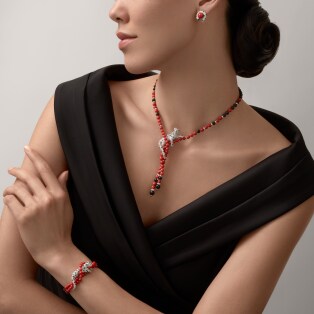 Panthère de Cartier earrings White gold, coral, onyx, emeralds, diamonds