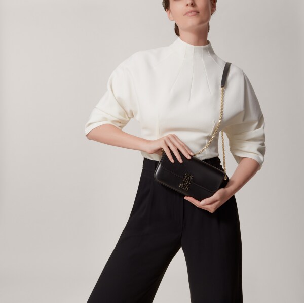 手袋，迷你款，C de Cartier 黑色小牛皮，金色及黑色琺瑯飾面