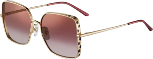 Panthère de Cartier sunglasses Smooth golden-finish metal, graduated burgundy lenses with rose gold-tone flash