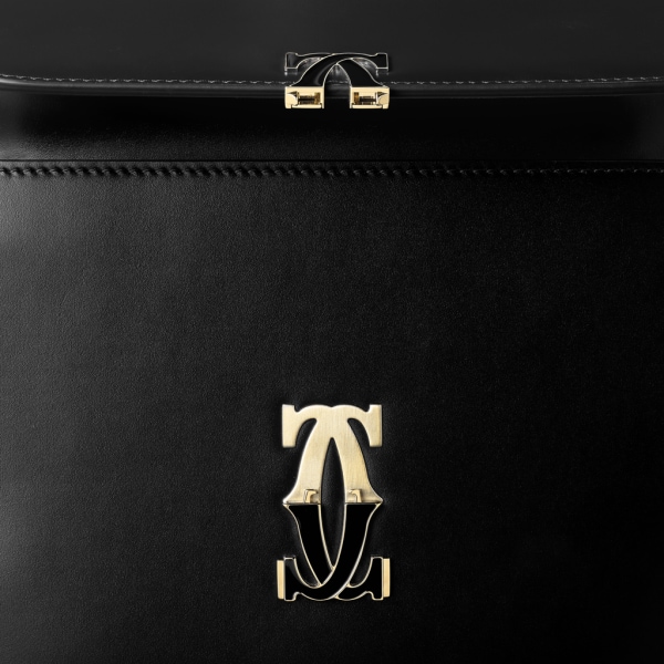 C de Cartier 手袋，迷你款 黑色小牛皮，金色及黑色琺瑯飾面