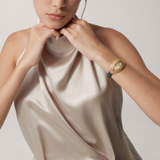 Cartier Libre 腕錶 大型款，手動上鏈機械機芯，18K黃金，鑽石，黃色藍寶石，優質寶石