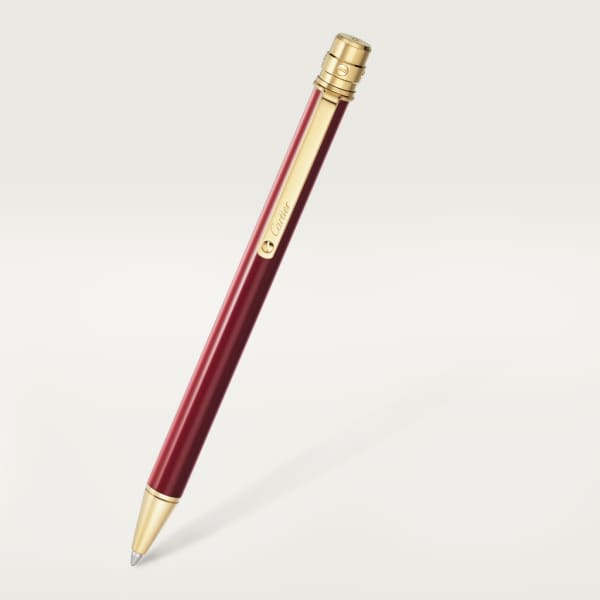 Santos de Cartier ballpoint pen Small model, burgundy lacquer, gold finish