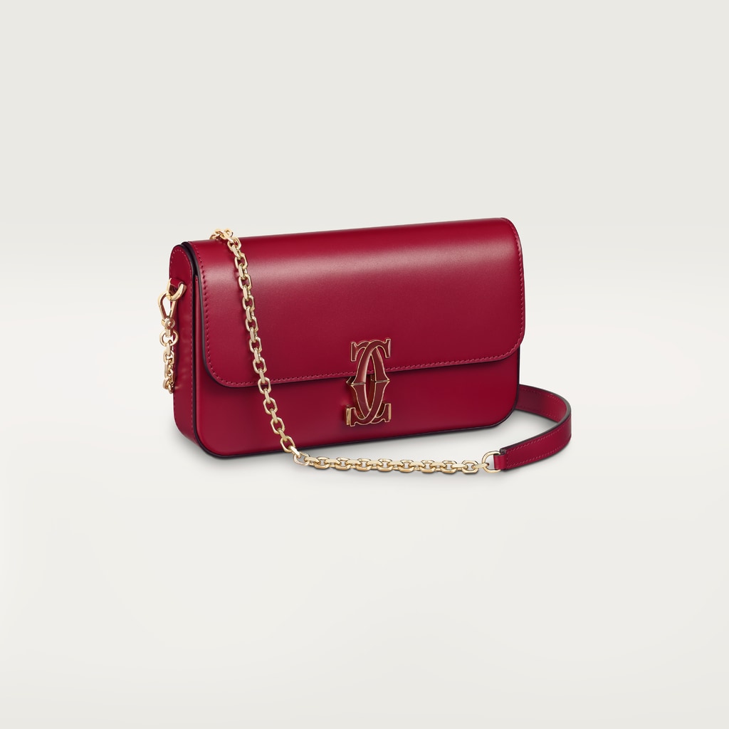 鏈帶手袋，迷你款，C de Cartier櫻桃紅色小牛皮，金色及櫻桃紅色琺瑯飾面