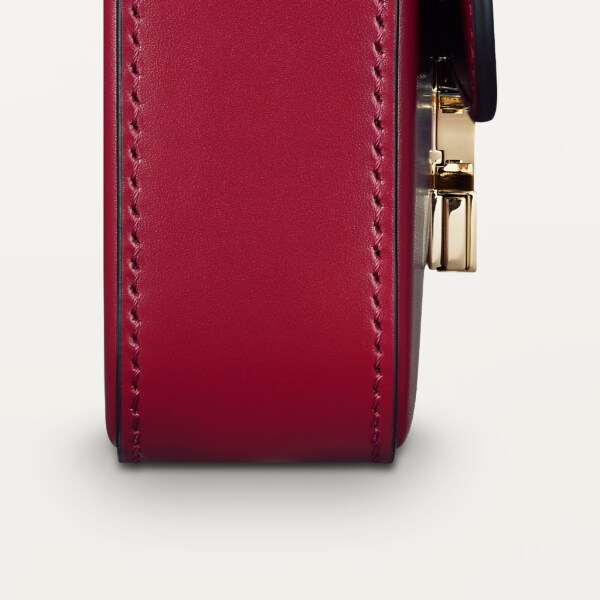 鏈帶手袋，迷你款，Double C de Cartier 櫻桃紅色小牛皮，金色及櫻桃紅色琺瑯飾面