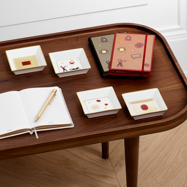 Set of four Diabolo de Cartier trinket trays, small model Porcelain