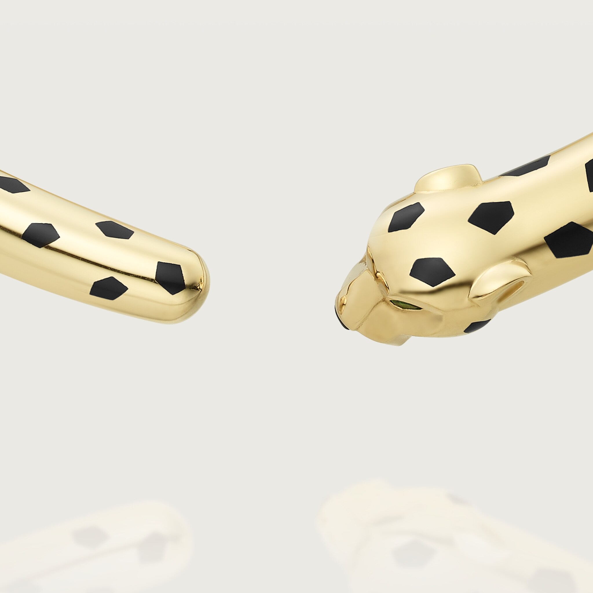 Panthère de Cartier torque necklace, articulatedYellow gold, lacquer, onyx, tsavorite garnets