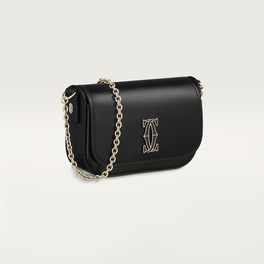 鏈帶手袋，微型款，C de Cartier黑色小牛皮，金色及黑色琺瑯飾面
