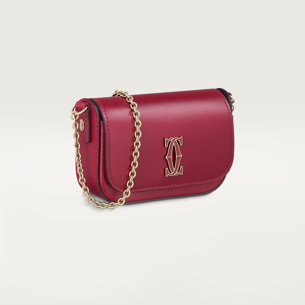 鏈帶手袋，微型款，C de Cartier櫻桃紅色小牛皮，金色飾面及櫻桃紅色琺瑯