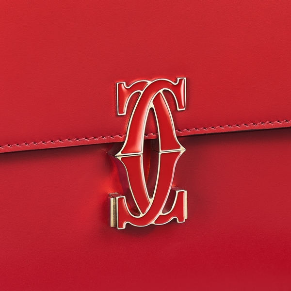 Mini shoulder bag, C de Cartier Red calfskin, golden finish and red enamel