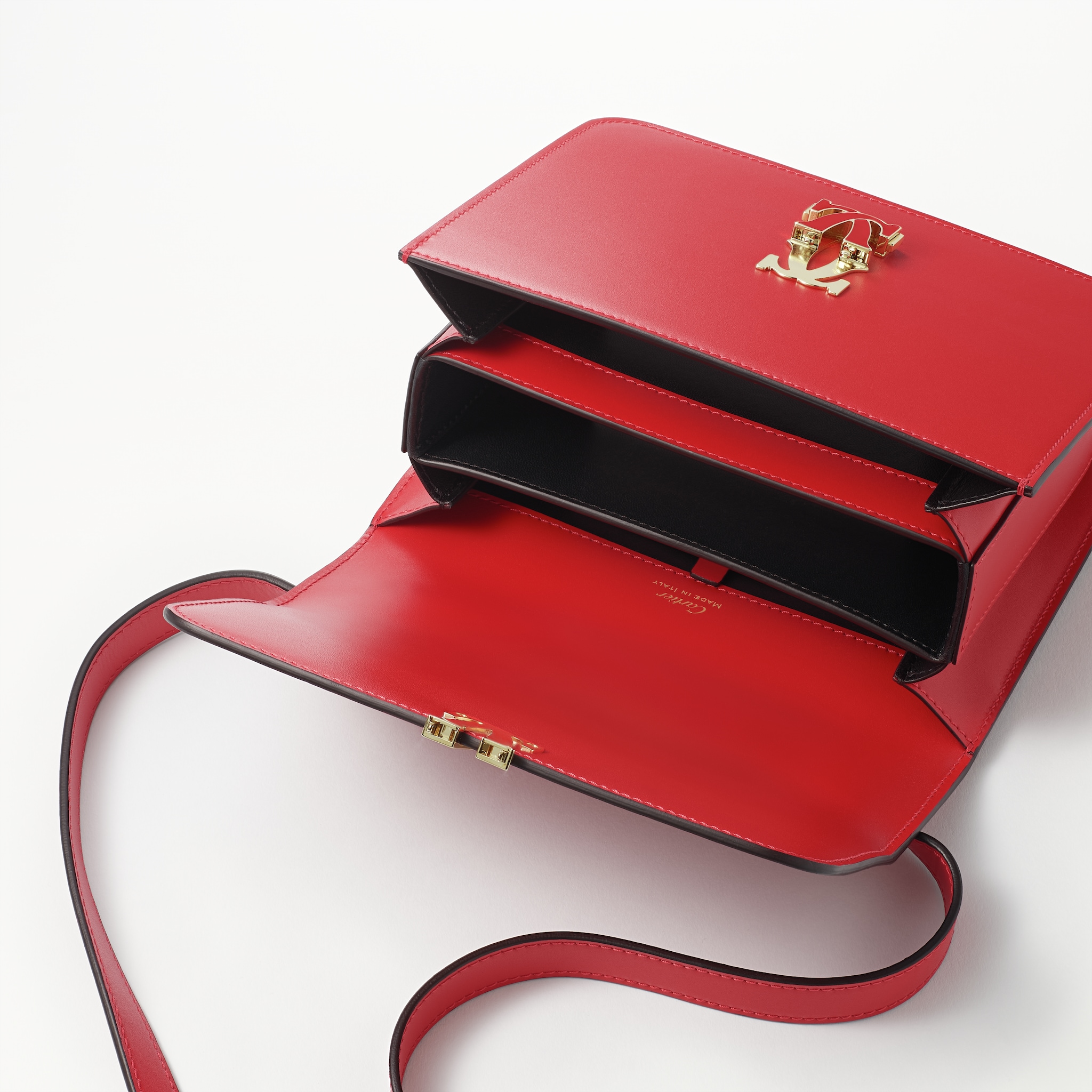 Mini shoulder bag, C de CartierRed calfskin, golden finish and red enamel