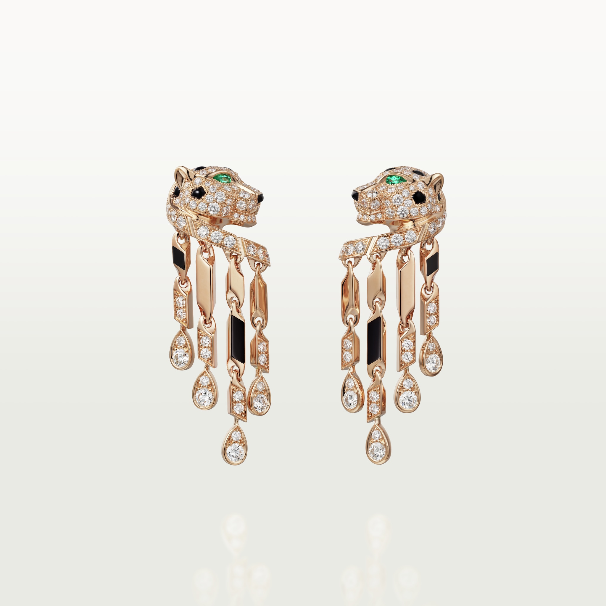 Panthère de Cartier earringsRose gold, onyx, emeralds, diamonds