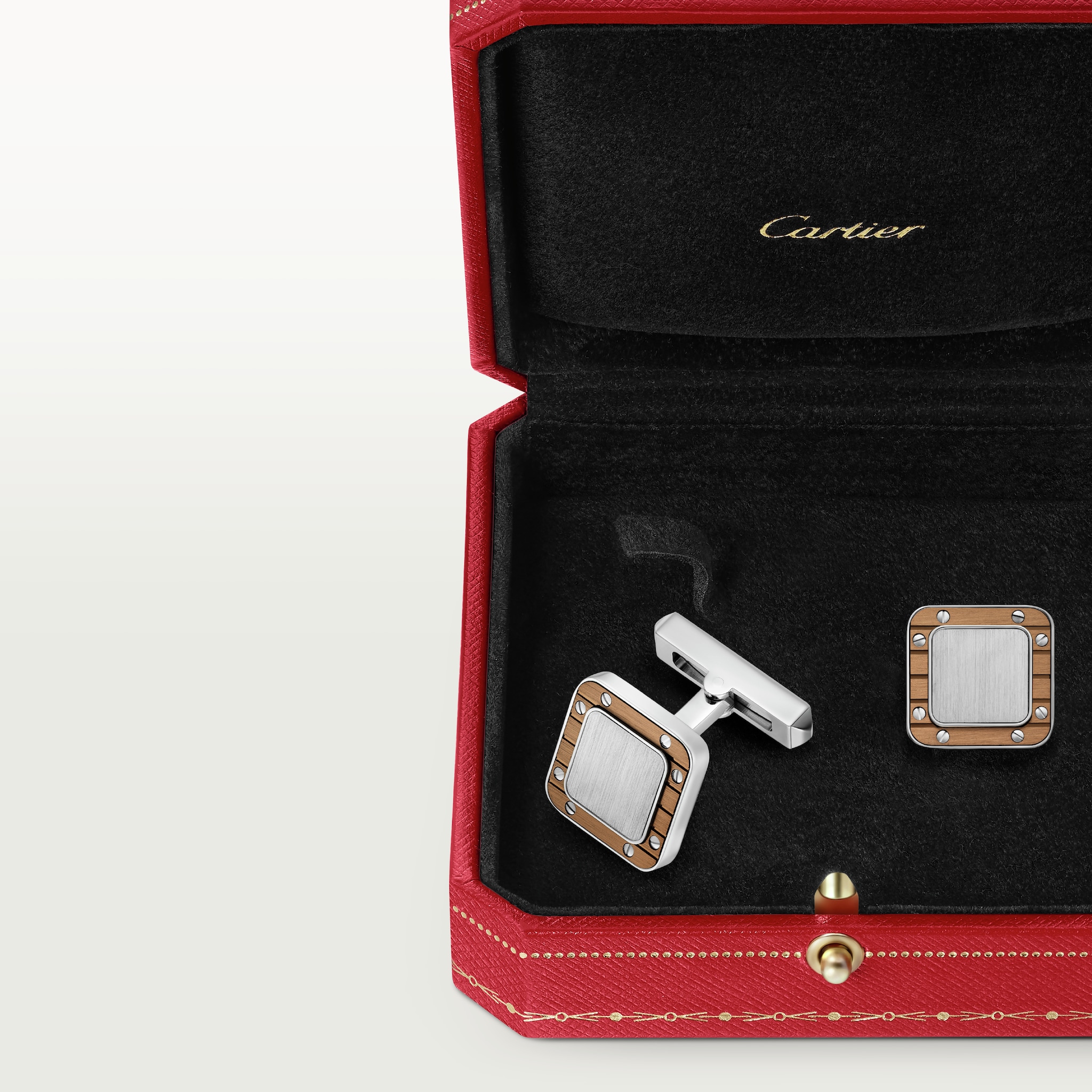 Santos de Cartier cufflinksPalladium-finish sterling silver and striated metal covered with amber brown PVD
