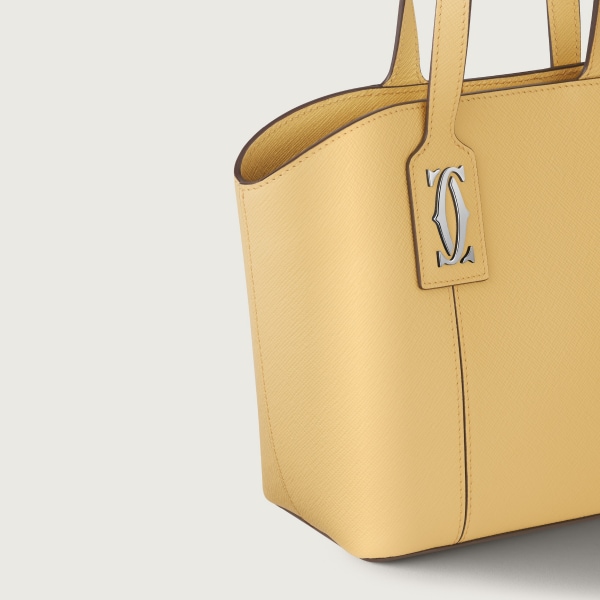 Mini tote bag, C de Cartier Mimosa yellow textured calfskin, embroidery, palladium finish