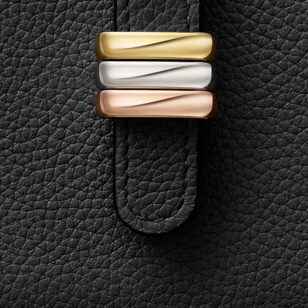 風琴式卡片夾，Trinity 黑色粒面小牛皮，金色、鍍鈀及玫瑰金色飾面